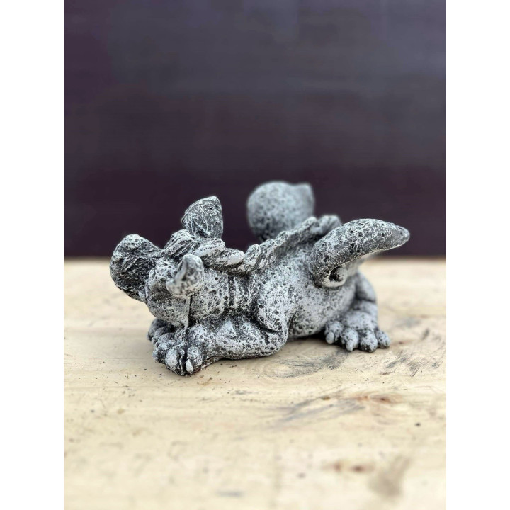 Kacsintó sárkány szobor